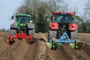 Keoghs tractors ploughing field
