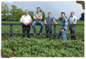 Keoghs crisps family in potato field