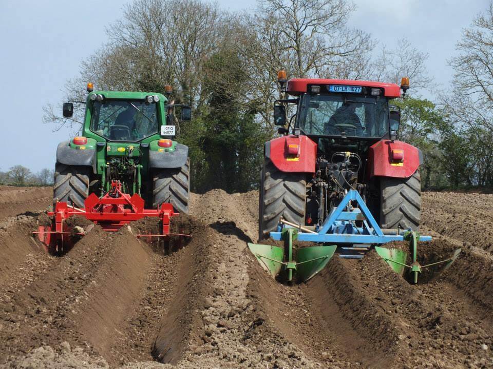 Keoghs crisps tractors ploughing field