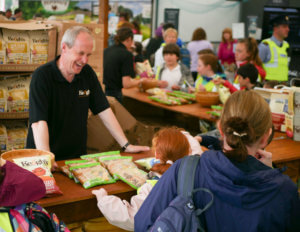 staff member laughing kids