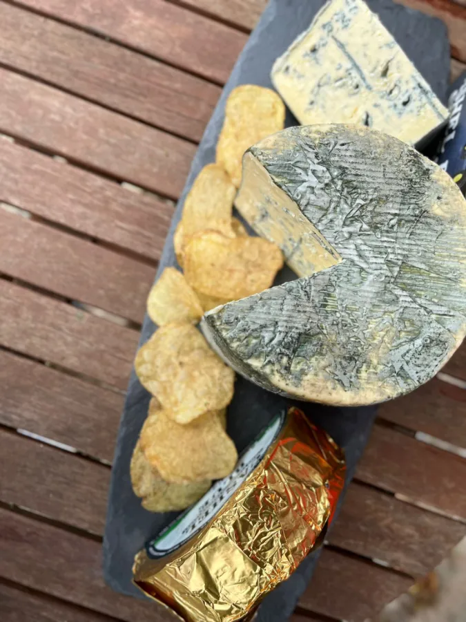 blue cheese on wooden boards